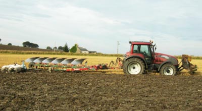 farmland ploughing tractor